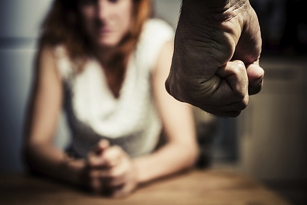 Woman in fear of domestic abuse Woman in fear of domestic abuse
